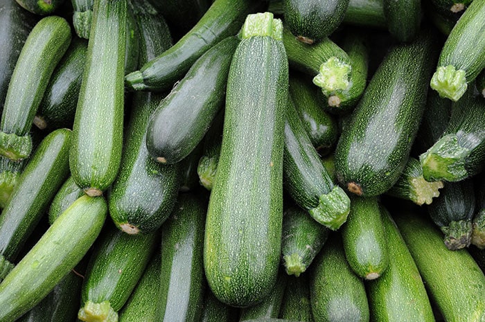 Piles of fresh zucchini